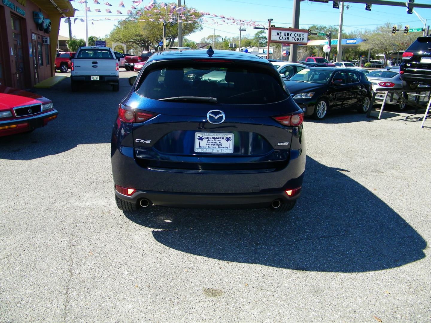 2018 Blue /Black Mazda CX-5 Grand Touring (JM3KFADM8J1) with an 2.5L L4 DOHC 16V engine, 6A transmission, located at 4000 Bee Ridge Road, Sarasota, FL, 34233, (941) 926-0300, 27.298664, -82.489151 - Photo#4